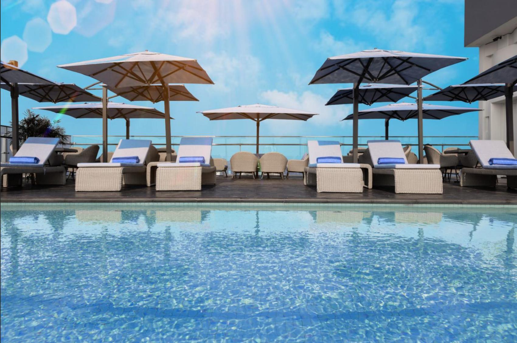 Wink Icon Hotel Danang Riverside - Luxury Suites - 24Hrs Stay & Rooftop Pool Bar Exterior photo